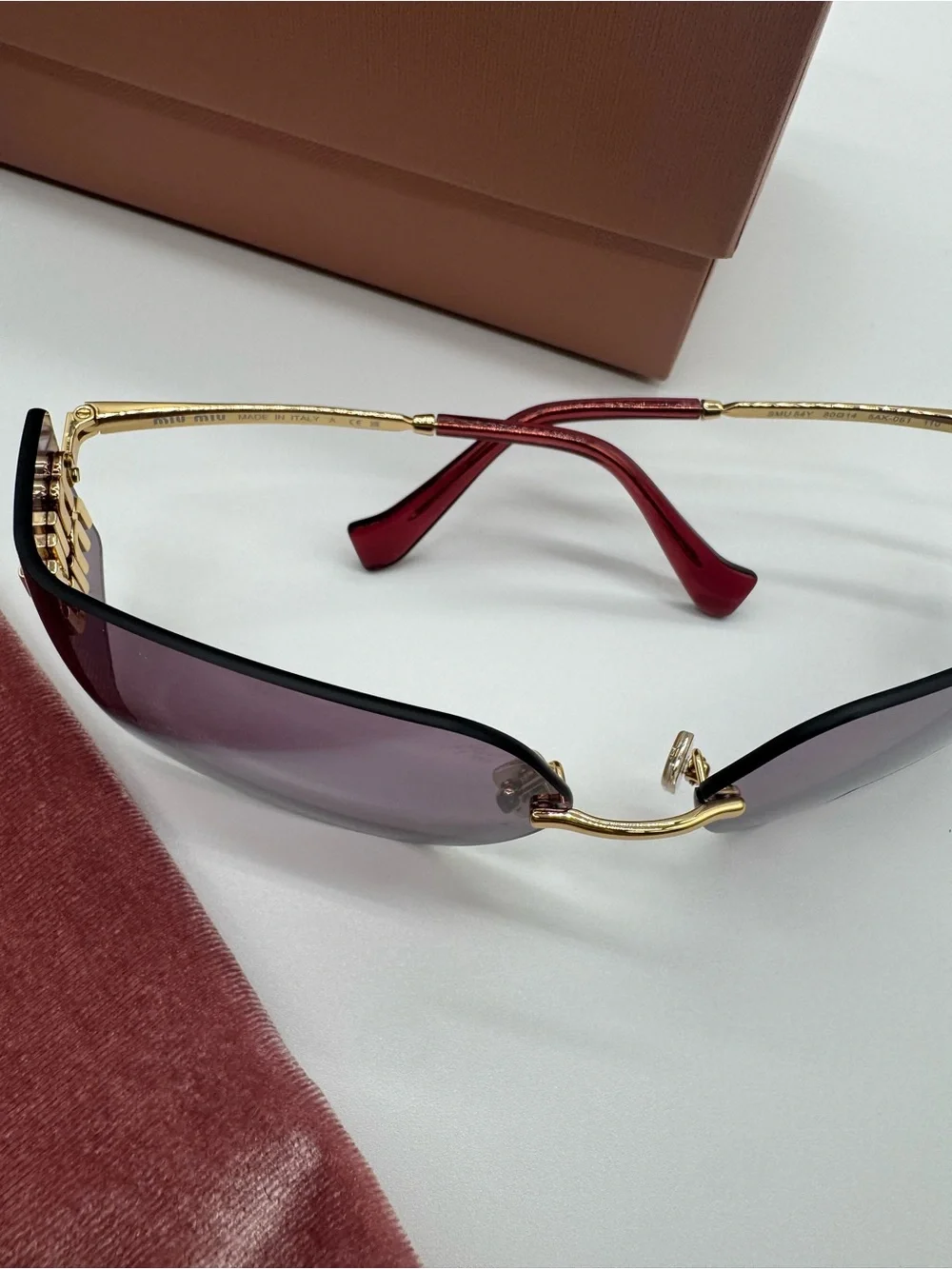 Miu Miu Purple Rimless Sunglasses with Gold Accents